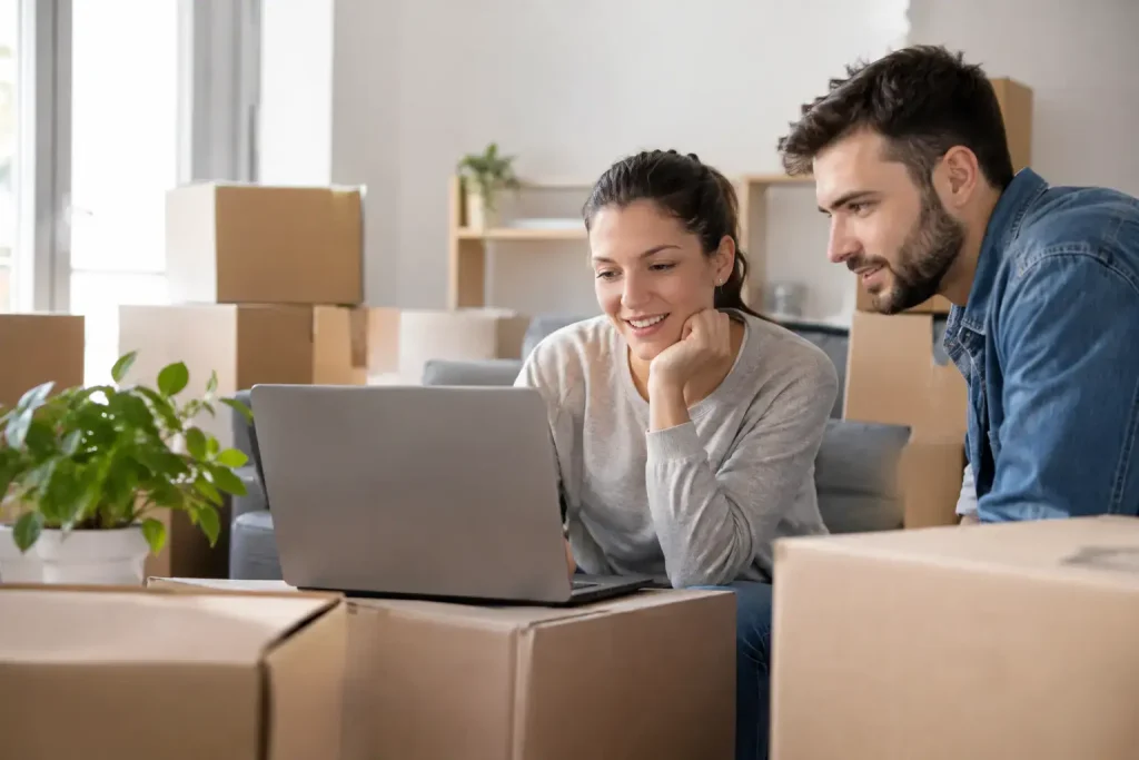 Couple planning their move online — the kind of qualified lead Sirelo connects with moving companies.